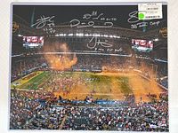 Overall 16x20 photo showing confetti-filled stadium and all five silver ink signatures