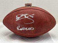 Front view of Wilson NFL football with autograph and inscription