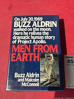 Front cover dust jacket showing title text and astronaut image