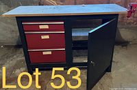Front and side view of small metal work bench showing three red drawers, cabinet door open, and wooden/composite work surface.