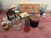 Full lot overview showing flower pots, vases, baskets, wooden and vintage boxes, and lantern.