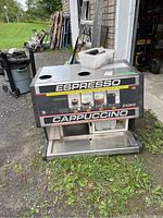 Front view of Acorto commercial coffee machine showing product images and labeling.