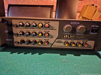 Full front view of Live BQ 3100 powered amplifier showing control knobs, power switch, and branding.