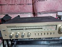 Full front view of Marantz SR225 stereo receiver showing control knobs, power button, tuner display, and overall unit condition.