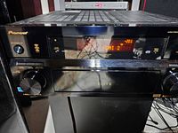 Front view of the Pioneer Elite receiver powered on showing HDMI 2 input on display and volume at -20.1.