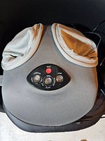 View of Relaxzen foot massager top with control panel and fabric foot compartments