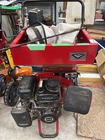 Front side view of Viper wood chipper showing red metal hopper, engine, and wheels.