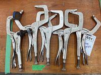 Four Irwin 11R Vise Grips arranged on table, showing overall condition and size.