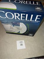 Photo of the boxed Corelle Livingware 16-piece set from front, showing brand and product type.