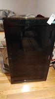 Front view of 40-inch Samsung TV showing black bezel and screen, no visible damage.