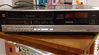 Front and top angled view of National NV-780 VCR showing controls, brand labeling and cassette slot.