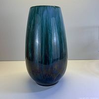 Full front view of large vintage ceramic vase showing blue and green glossy drip glaze pattern.