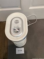 Top view of Honeywell air purifier showing control dial and power cord arrangement.