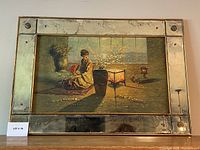 Full front view of framed canvas print showing mirrored panel frame and artwork