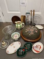 Photo showing assortment of vintage kitchenware, china and cross stitch footstool