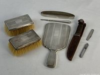 Seven-piece set arranged flat on white background