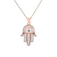 Sterling silver pendant in the shape of a Hamsa hand with round moissanite stones, photographed on white background.