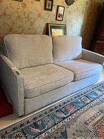 Front-left view of the sofa bed in room setting