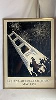 Front view of the vintage Golden Gate Bridge celebration poster with beige plastic frame showing wear.