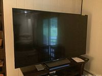 Front view of the TV on stand