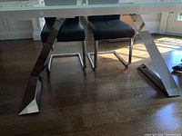 Full view of table and base showing frosted glass top