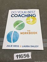 Front cover of the workbook showing title, authors, and colorful design elements.