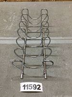 Front view of the Spectrum Diversified Euro Lid Organizer showing the full rack with rounded holders.