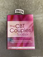 Front cover of The CBT Couples Toolbox book showing title, authors, and design details.