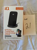 Photo of front of box showing iQ Qi Wireless Charging Stand with fast charging support and compatible with Qi wireless devices.