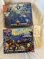 Image showing front of both puzzle boxes, Under the Sea 100-piece puzzle and Underwater 48-piece puzzle