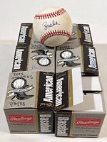 Six Rawlings American League baseball boxes with two balls shown, one ball signed by Bob Welch and another signed by David Zancanaro, photos show player names and dates written on the boxes.