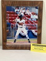 Full view of the framed, mounted autographed photo featuring Royce Clayton at bat in a white MLB uniform, with Certificate of Authenticity visible at the base.