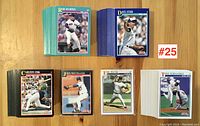 Top view showing multiple stacks of 1991 Score baseball cards featuring players Rob Murphy, Dave Stieb, Carlton Fisk, John Wetteland, Eric Plunk, Tony Fernandez in a variety of colored bordered cards.