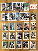 30 baseball cards laid flat with players shown from Bowman 1990 and O-Pee-Chee Premiere 1992 sets.