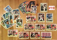 Photo showing a collection of 36 baseball cards spread on a surface. Cards are from Topps and Score brands, dated 1988 and 1990, featuring various MLB players in good condition.