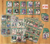 Image of multiple stacks of 1991 Donruss baseball cards including MVP subset cards arranged on flat surface with label #36 visible.