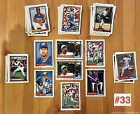 Various 1991 'O-Pee-Chee' baseball cards grouped and displayed on flat surface, showing multiple cards including Blue Jays players.