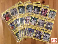 Display of approximately 45 yellow-bordered 1991 Fleer baseball cards, including 36 Toronto Blue Jays and 9 Montreal Expos cards arranged on a wood surface.