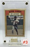1972 O-Pee-Chee Hank Aaron baseball card encased in a protective plastic holder, showing front of card.