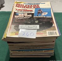 Stack of 52 Military Modeler magazines showing thickness and edge wear.