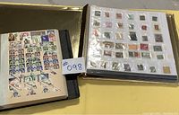 Two stamp pages with assorted stamps, clear sheet overlay with various colorful stamps and a mounting sheet with printed stamps arranged