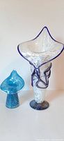 Tall white and blue Jack in the Pulpit handblown glass vase with clear white confetti body and blue accents
