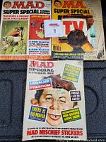 Three vintage MAD magazines: two Super Special editions (#17 and another) and one Special Number Six, all with colorful satirical covers.
