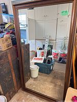 Full front view of the mirror showing overall size and condition.