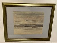 Front view of the framed watercolor painting showing the muted color shoreline scene and signature dated 1962.