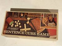 Top view of vintage Scrabble Sentence Cube Game box with game title and images of dice and players
