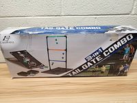 Photo of the front and side of the original Eastpoint 3-in-1 Tailgate Combo box showing product images and branding.