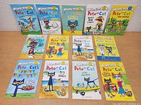 Overview of 12 Pete The Cat books arranged on a flat surface showing the front covers and some back covers.