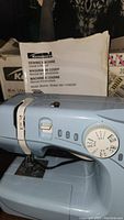 Kenmore sewing machine with foot pedal and instruction manual in original box, model 385.11206300