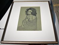 Framed graphite charcoal drawing of a semi nude woman by Frederick Bourchier Taylor, front view showing the full artwork and frame.